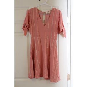 Light pink dress with embroidery